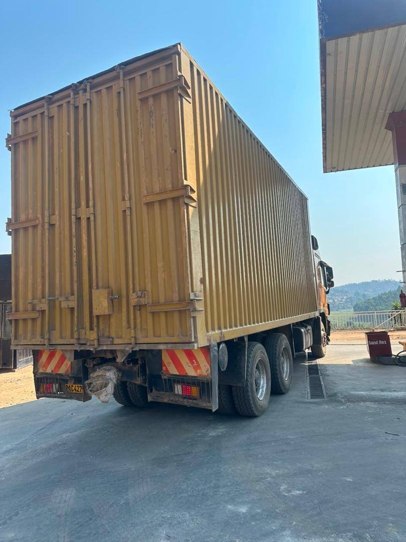 Megira truck delivering a shipping container