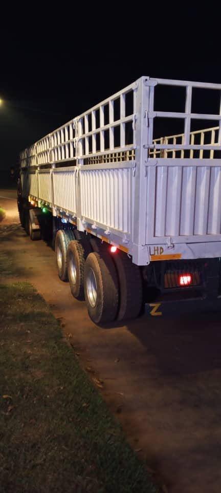 Megira long-haul flatbed truck on the road