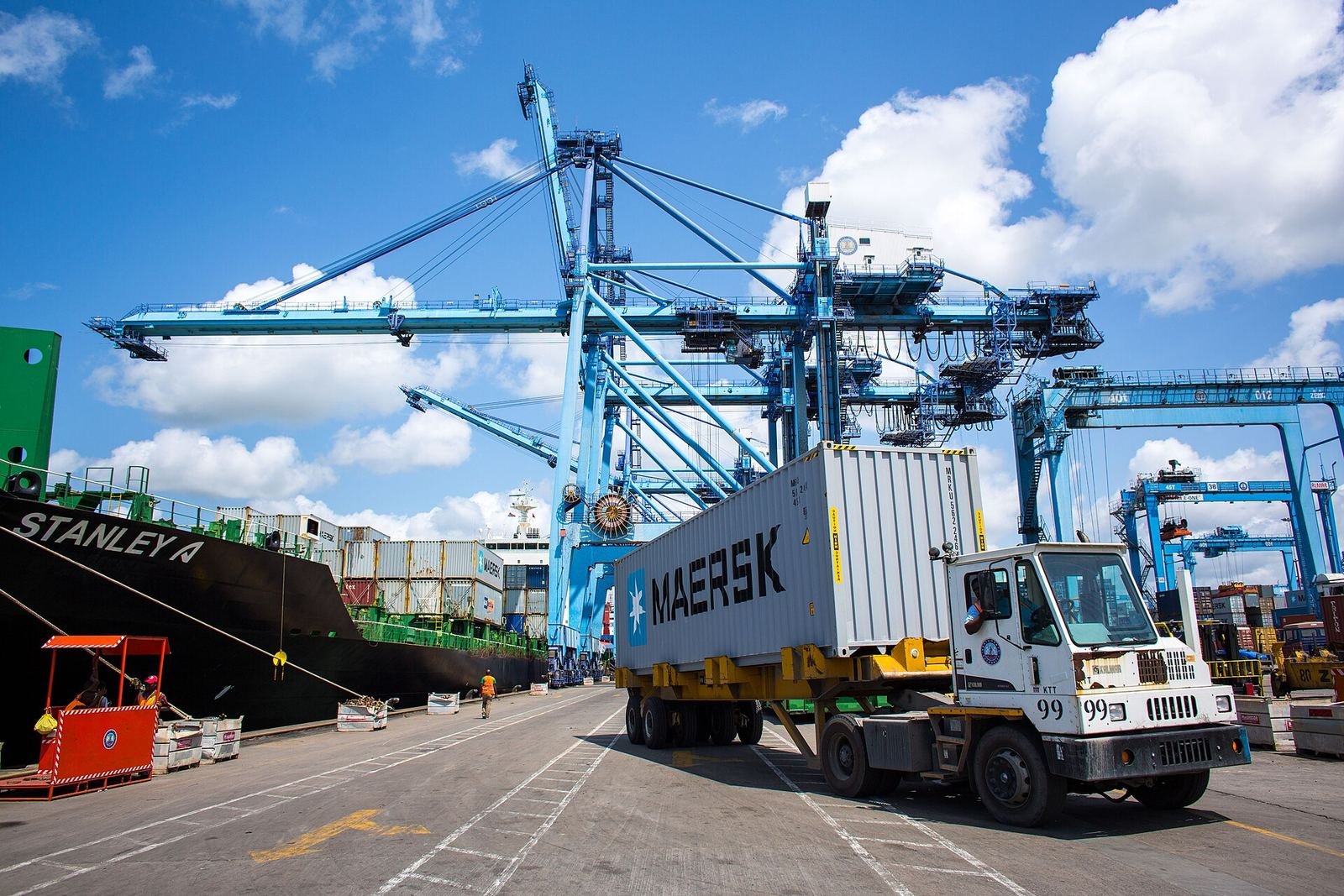 Port crane and container truck at the Port of Mombasa container terminal